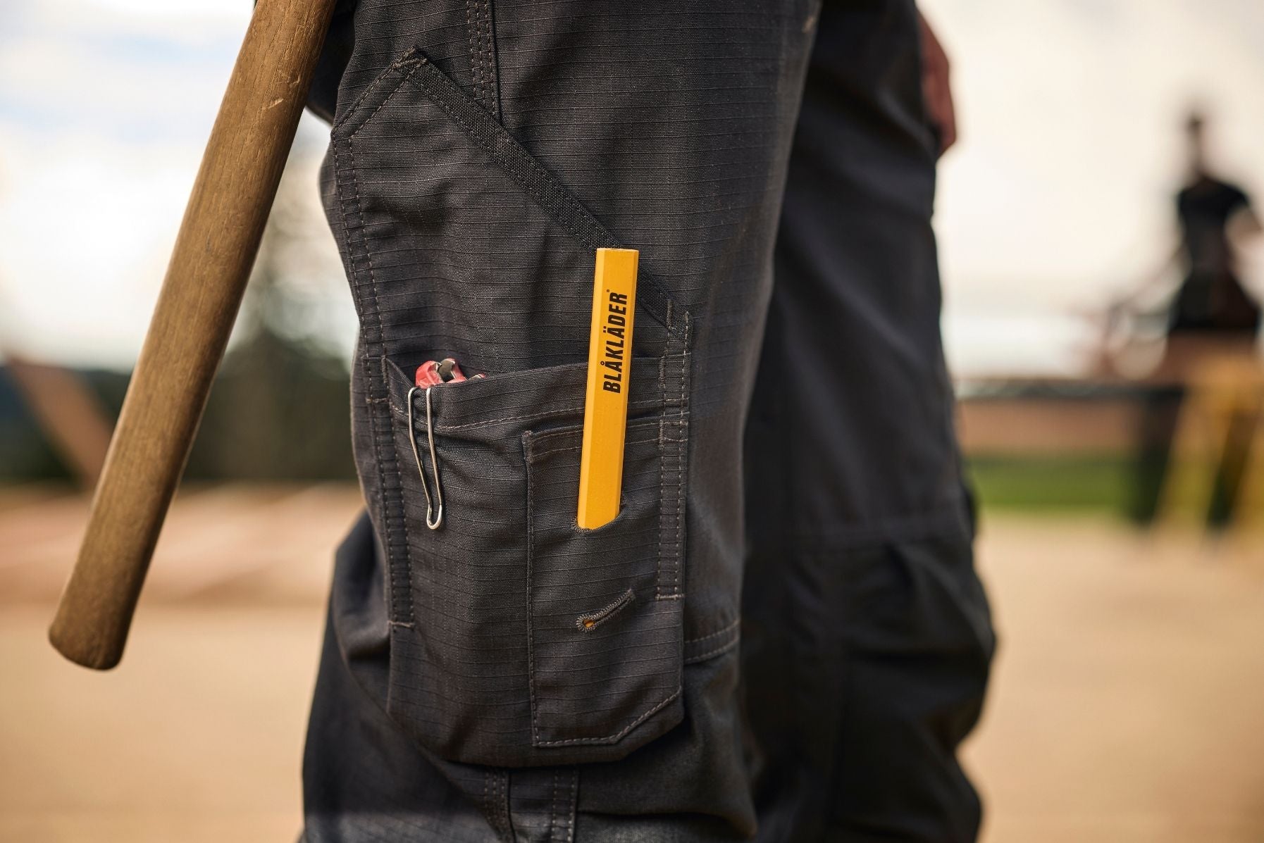 Blaklader Ripstop Pants in Black triple stitched seam detail with carpenter pencil and pliers in tool pocket