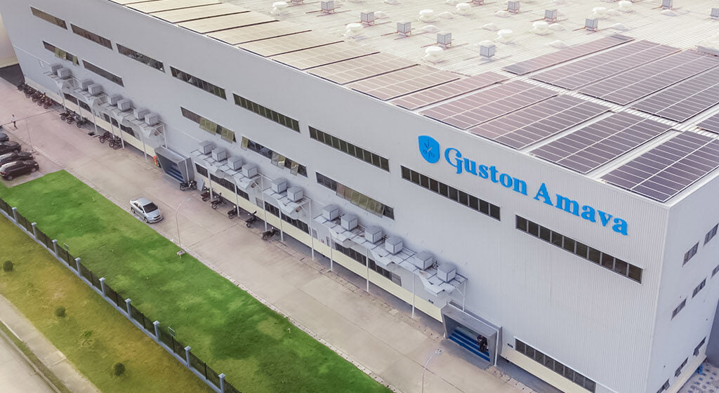 Guston Amaya building with solar panels on the roof